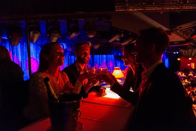 Moulin Rouge Dinner Show with Champagne and Drop Off - Seating, sightlines, and the packed room